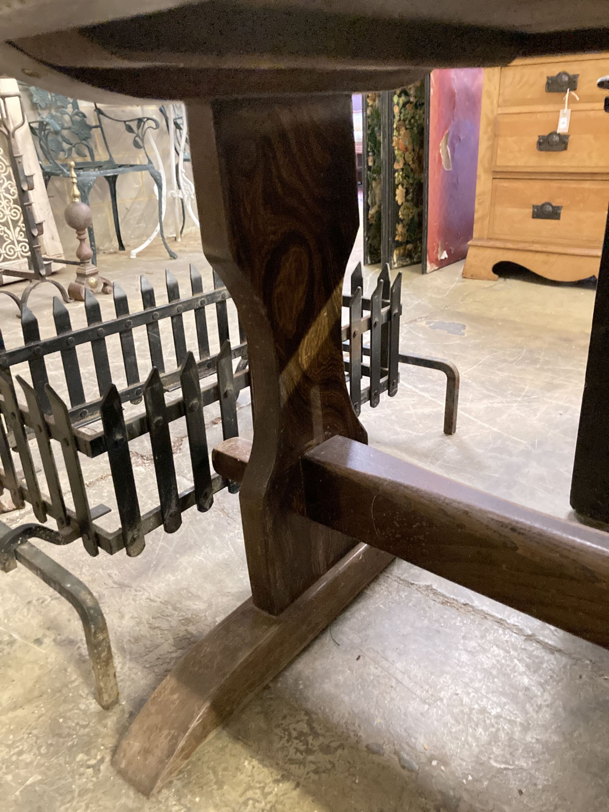 An 18th century style rectangular refectory dining table on trestle end supports, length 212cm, depth 80cm, height 74cm